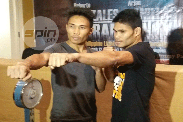 Fists up for Arjan Canillas (left) and Roberto Gonzales, who fight for the vacant Philippine lightweight championship on Saturday. Gerry Ramos
